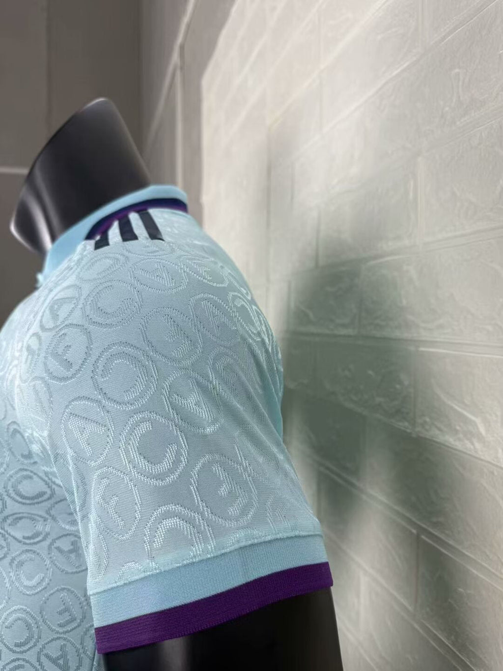 2025/26 Arsenal Special Edition Player Version Jersey - Ice Blue Body All-Over Tonal Cannon Circular Emboss Pattern Deep Purple Polo Collar Deep Purple Sleeve Cuff Trim - Dark Navy Three Stripes - Dark Navy Arsenal Cannon Crest - Emirates Fly Better