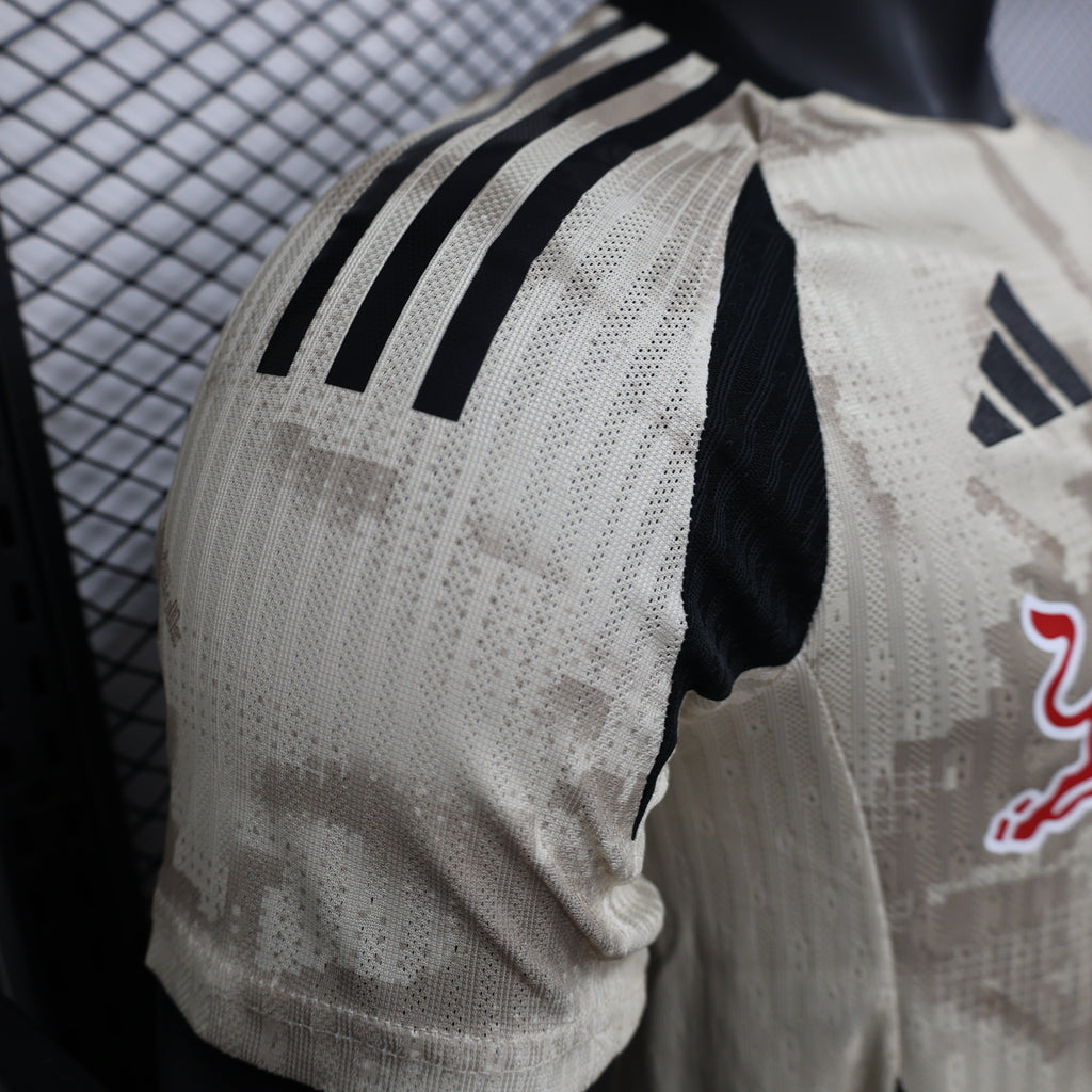 2025/26 New York Red Bulls Away Player Version Jersey - Adidas - Off-White Cream Desert Camouflage Pattern - Black Side Panels - Red Bull Double Bull Yellow Sun Crest