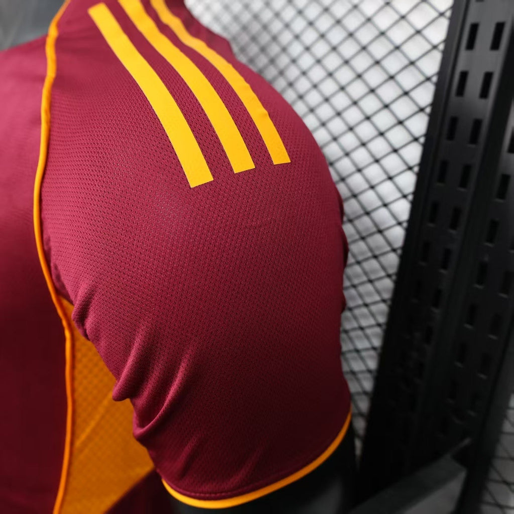 2025/26 AS Roma Home Player Version Jersey - Deep Maroon Body Gold Yellow Side Panel Stripe Seam Detail Gold Yellow Three Stripes - AS Roma Official Shield Crest Gold Yellow Purple She-Wolf Romulus Remus - Men's