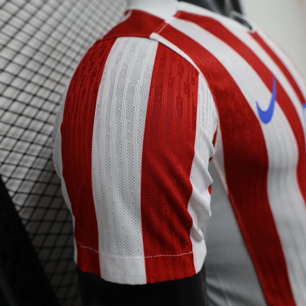 2025/26 Atlético de Madrid Home Player Version Jersey -  Red & White Vertical Wide Stripe - White V-Neck Collar - Blue Nike Swoosh - Atlético Crest - Riyadh Air Blue Sponsor