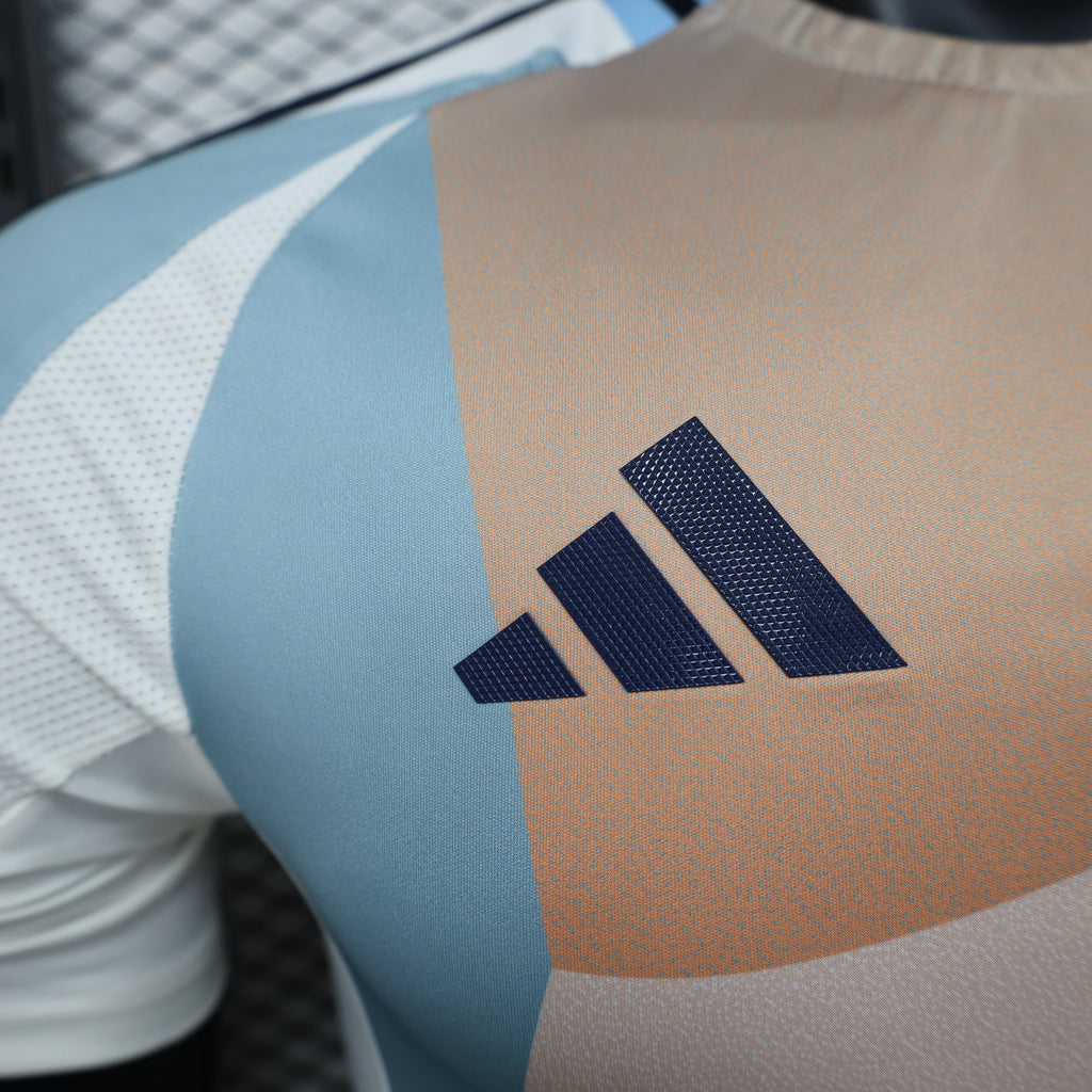 2025/26 Spain Pre-Match Player Version Jersey -White Body - Desert Tan Apricot & Light Blue-Grey Diagonal Colour Block Panels - Dark Navy Crew Neck Collar - RFEF Crest