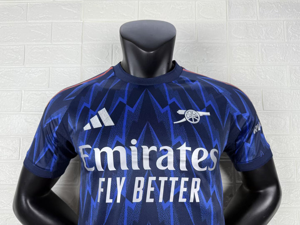 2025/26 Arsenal Away Player Version Jersey - Dark Navy Blue Body All-Over Blue Lightning Bolt Zigzag Graphic - White Three Stripes - Arsenal Cannon Crest - Emirates Fly Better Principal Sponsor