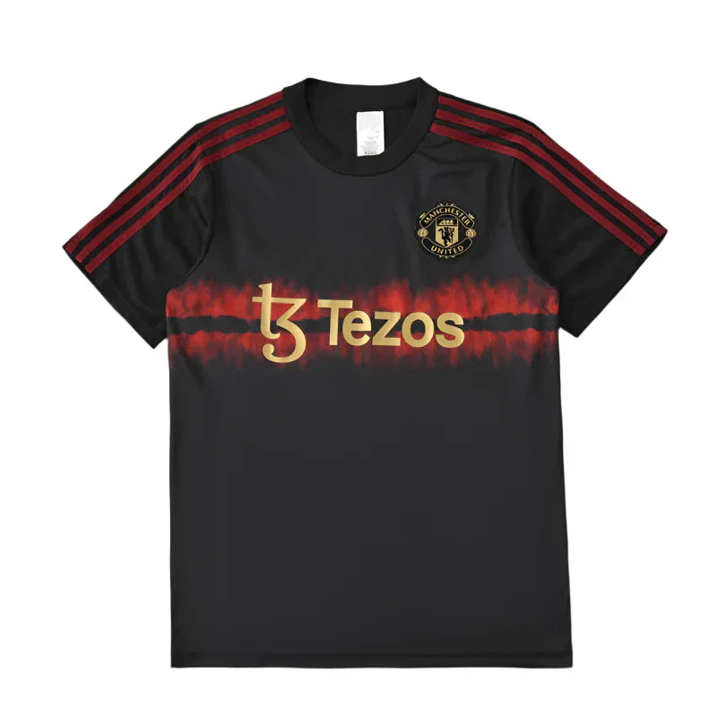 Manchester United Year of the Snake Limited Edition Training Shirt Fan Version 2024/25 – Black Gold Tezos Pre-Match Top
