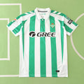 Real Betis Balompié Home Fan Version 2024/25 X Edition – Green & White Vertical Stripe La Liga Football Jersey | Gold Crest
