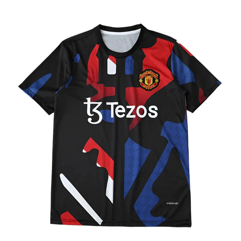 Manchester United Training Shirt Fan Version 2024/25 – Black Red Blue Geometric Tezos Pre-Match Top